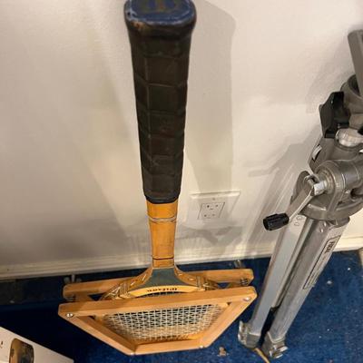 Basement:  Tennis Racket and Tri Pod 