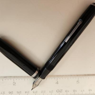 Sale Photo Thumbnail #300: This lot is for a Vintage Esterbrook Fountain Pen - #2.  In good condition.  Founded in 1858 by Richard Esterbrook in New Jersey, the Esterbrook Pen Company became the largest U.S. pen manufacturer, famous for durable, affordable fountain pens with interc