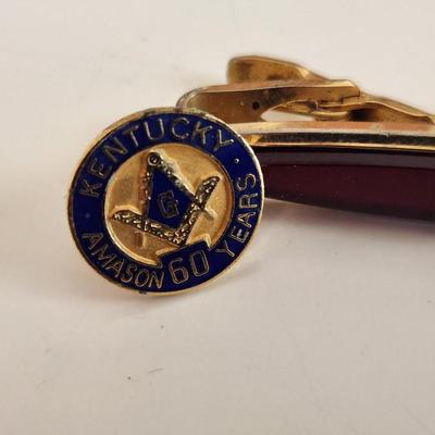 Sale Photo Thumbnail #311: This lot is for a Vintage Masonic Clasp and Membership Pins.  The clasp is marked Spiedel on the reverse. The pins mark the milestones of 50 and 60 years of membership.  Great items for those in the lodge.