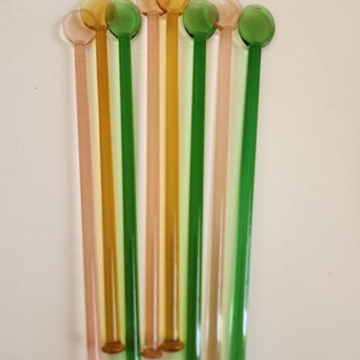 Sale Photo Thumbnail #338: This lot is for a Set of 8 Glass Cocktail Stirrers.  This colorful set contains stirrers in green, pink and orange. Great for so many purposes - especially stirring that 5PM cocktail.