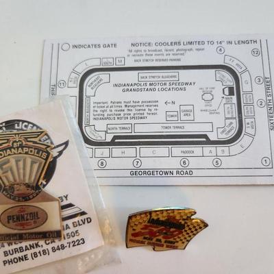 Sale Photo Thumbnail #350: This lot is for a grouping of Indy 500 Collectibles. Included are a 1991 paper ticket, a 1989 Kodak Racing Pin and a 1997 Pennzoil Motor Oil Pin in its original packaging.  Nice find if you are into the Indy 500.