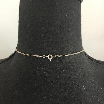 Glass pendant and silver tone chain