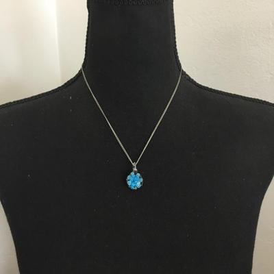 Glass pendant and silver tone chain
