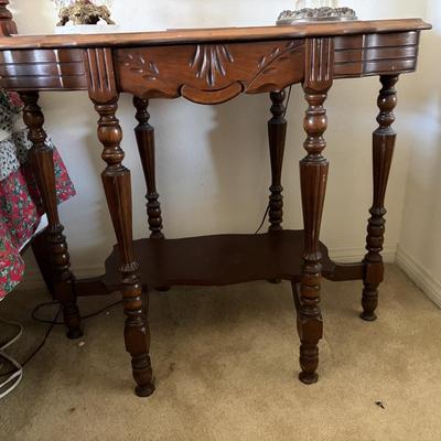 Six-legged walnut lamp table