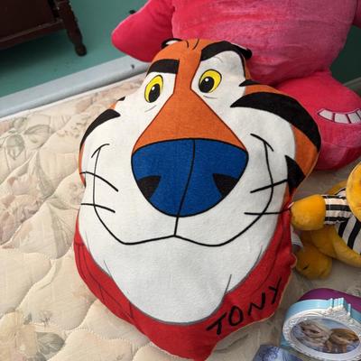 Three stuffed animals and toys