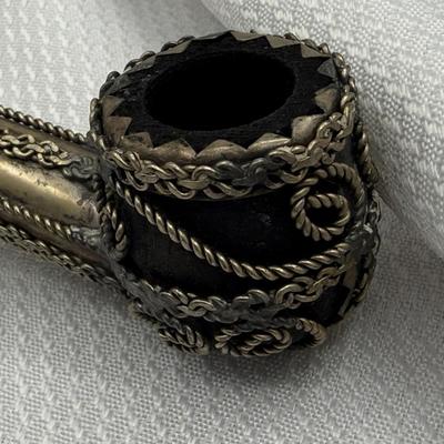 Sale Photo Thumbnail #319: Decorative silver pipe with elaborate metalwork, collectable tobacco smoking pipe.
Eastern European.  Shows wear on silver.
6.75 inches