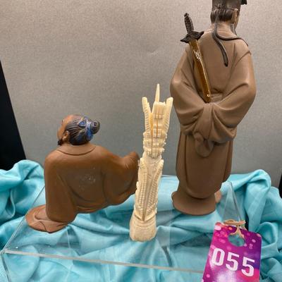 Sale Photo Thumbnail #334: Sitting, Mudmen Clay Sculpture
Standing - Carrying sword behind back, Mudmen
Indonesian carved bone totem