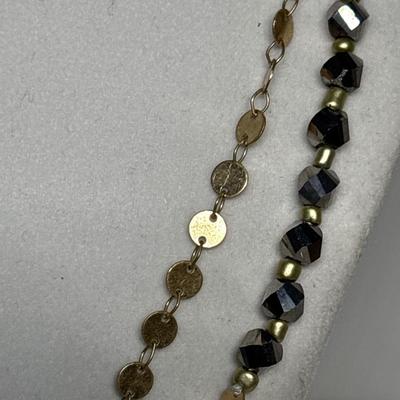 Delicate gold with silver bead necklace