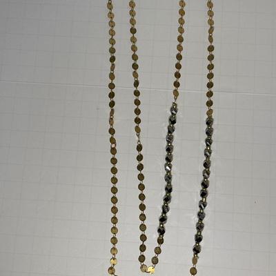 Delicate gold with silver bead necklace