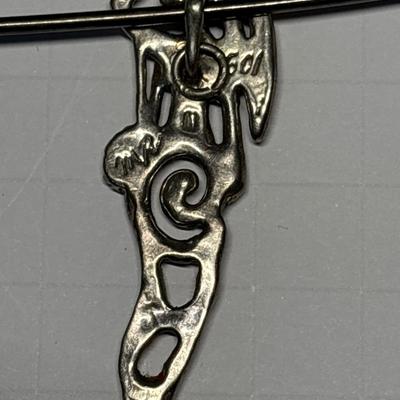 Lady pendant on vintage safety pin