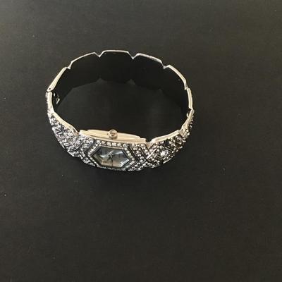 Sale Photo Thumbnail #55: Silver tone with clear Rhinestones peck & peck woman’s watch Needs battery please see attached pictures