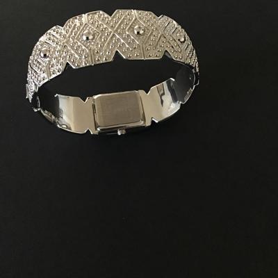 Sale Photo Thumbnail #56: Silver tone with clear Rhinestones peck & peck woman’s watch Needs battery please see attached pictures