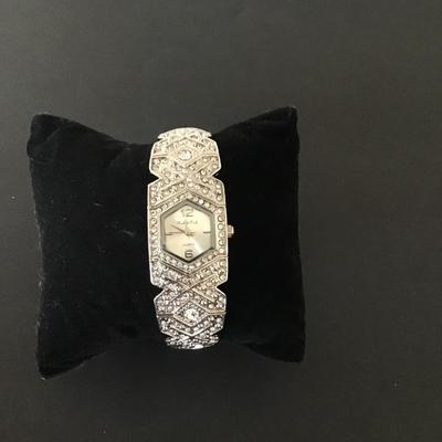 Sale Photo Thumbnail #54: Silver tone with clear Rhinestones peck & peck woman’s watch Needs battery please see attached pictures