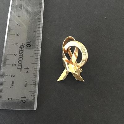 Sale Photo Thumbnail #65: Vintage gold tone ribbon Brooch Please see attached pictures