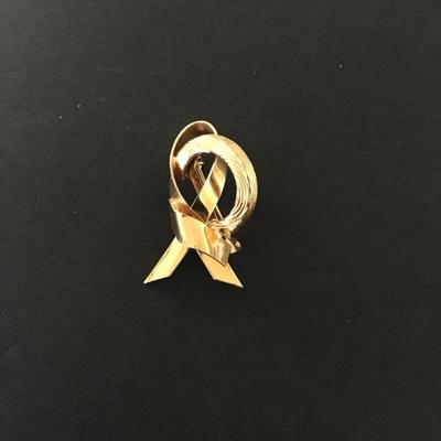 Sale Photo Thumbnail #64: Vintage gold tone ribbon Brooch Please see attached pictures