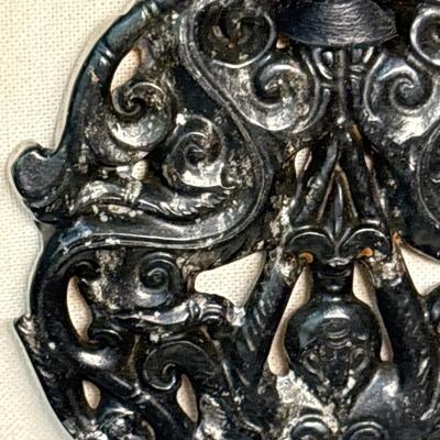 Carved Tibetan black protective stone pendant