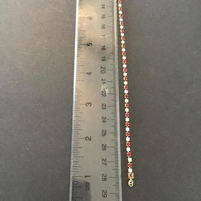 Sale Photo Thumbnail #174: Very nice clear and red Rhinestone Vintage Tennis Bracelet Please see attached pictures