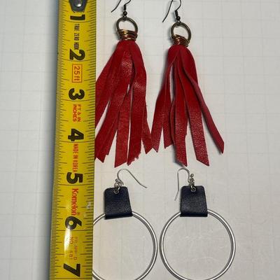 Earrings with leather embellishments