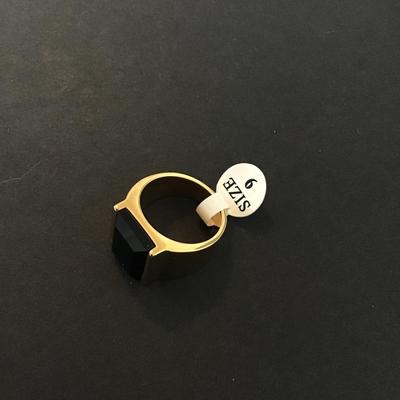 Sale Photo Thumbnail #215: Beautiful Gold Tone Fashion ring with black Glass onyx Type Stone please see attached pictures