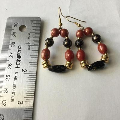 Red, black gold tone hoop earrings