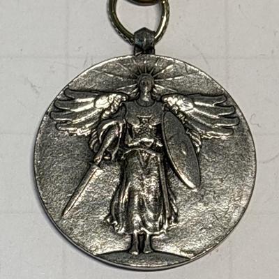 Medallion bracelet & cross earrings