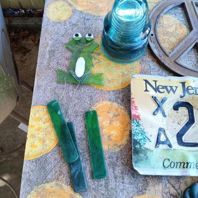 LOT 188: Cast Iron Star, Blue Glass Insulators, Glass Frog Wind Chime, Metal Peace Sign & More