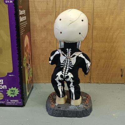 LOT 193: Empire Halloween Blow Mold Bear, Big Head Dancing Skeleton, Large Plastic Skull & More