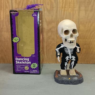 LOT 193: Empire Halloween Blow Mold Bear, Big Head Dancing Skeleton, Large Plastic Skull & More