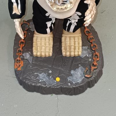 LOT 193: Empire Halloween Blow Mold Bear, Big Head Dancing Skeleton, Large Plastic Skull & More