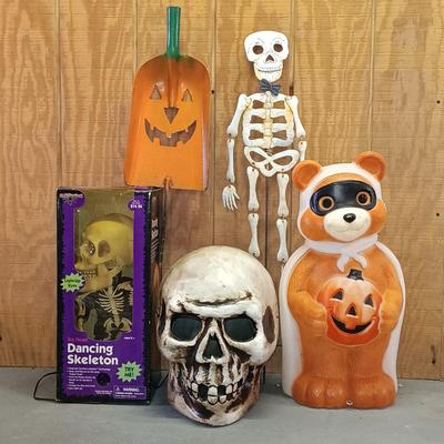 LOT 193: Empire Halloween Blow Mold Bear, Big Head Dancing Skeleton, Large Plastic Skull & More