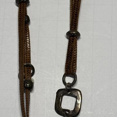 Sterling shark tooth-look pendant on leather cord