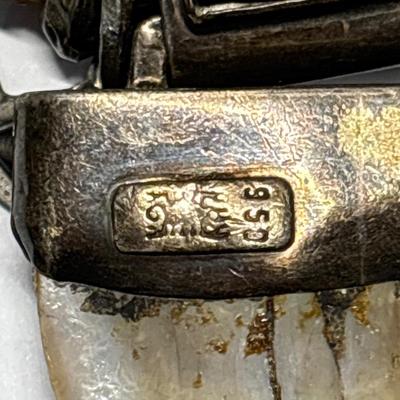 Sterling shark tooth-look pendant on leather cord