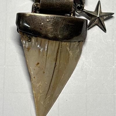Sterling shark tooth-look pendant on leather cord