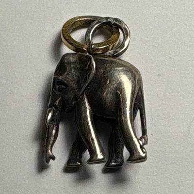 Elephant, lion rampant & bullet pendants