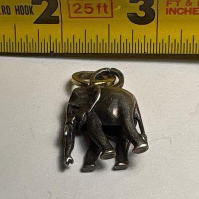 Elephant, lion rampant & bullet pendants