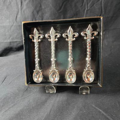 Sale Photo Thumbnail #371: This is for a new boxed set of Fleur de Lis Cocktail Spoons.  It's for a set of 4, never used in the original box.