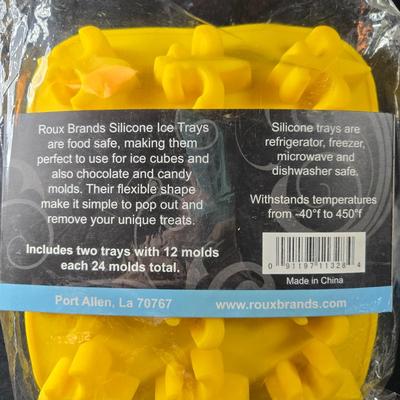 Sale Photo Thumbnail #379: This is s grouping of Fleur de Lis Items that could be used for entertaining.  It includes 2 etched glass coasters and a package of 2 silicone ice cube trays.  All items are new and never used.  The final picture is of the coaster outside of it's box.