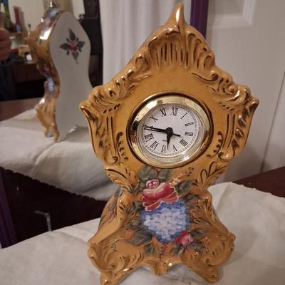Sale Photo Thumbnail #25: Beautiful Floral Porcelain Clock. Approximately 8" tall. Works well. No chips cracks or breaks. Runs on batteries.
