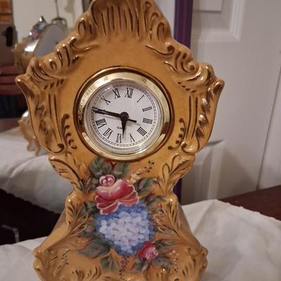 Sale Photo Thumbnail #22: Beautiful Floral Porcelain Clock. Approximately 8" tall. Works well. No chips cracks or breaks. Runs on batteries.