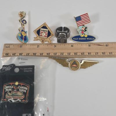 LOT 123: Ursinus College Athletics Watch, Multi-line Geometric Ring, and Various Pins