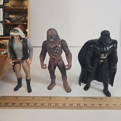 LOT 125: Multiple Star Wars Toy Figurines in C3PO Carrying Case