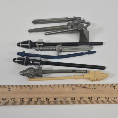 LOT 127: Small Soldiers Scratch It Power Drill Cycle Driver, Gorgonites Miniac Action Figures, and Multiple Tools and Weapons