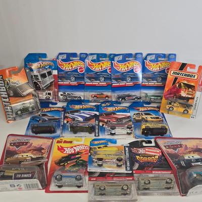 LOT 130: Multiple HotWheels, Matchbox, and Disney Pixar Cars/ All New in Package