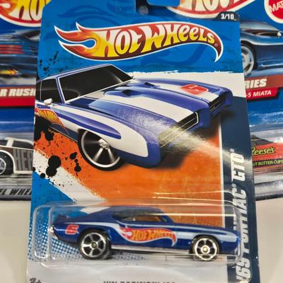 LOT 130: Multiple HotWheels, Matchbox, and Disney Pixar Cars/ All New in Package