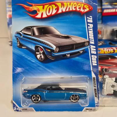LOT 130: Multiple HotWheels, Matchbox, and Disney Pixar Cars/ All New in Package