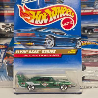 LOT 130: Multiple HotWheels, Matchbox, and Disney Pixar Cars/ All New in Package