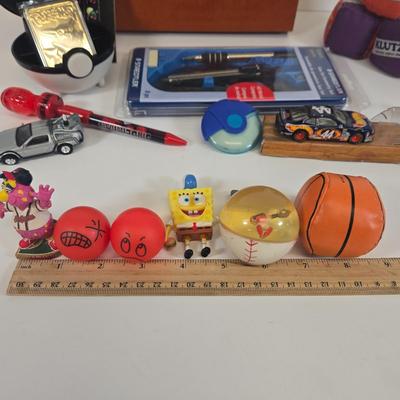 LOT 133: Ultimate Dice & Card Game Compendium, Pokémon 23k Gold Plated Trading Card, Unpunched Sheet of Official Magic: The Gathering...