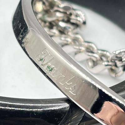 LOT 182J: Bracelet and Ring Collection featuring a Tibetan carved bone and Carnelian hinged bangle bracelet.