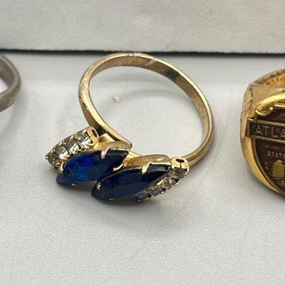 LOT 182J: Bracelet and Ring Collection featuring a Tibetan carved bone and Carnelian hinged bangle bracelet.