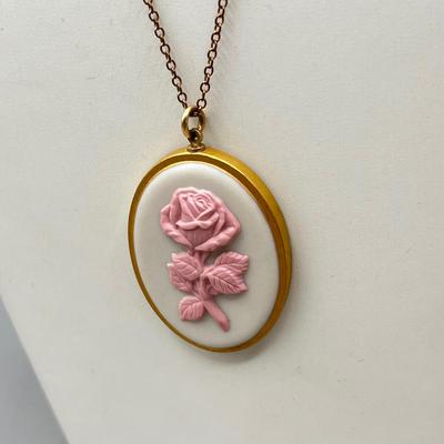 LOT 188: Collection of Gold Toned Necklaces Including One with Large Flower Pendant